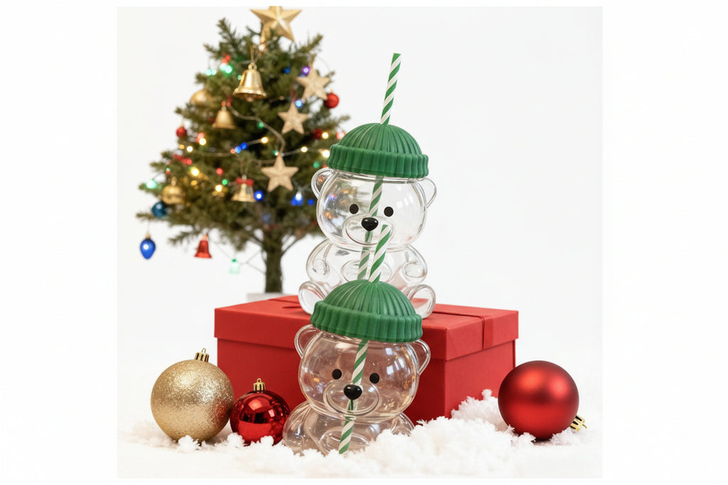 Cute bear glass cup with straw - close-up view of adorable bear design