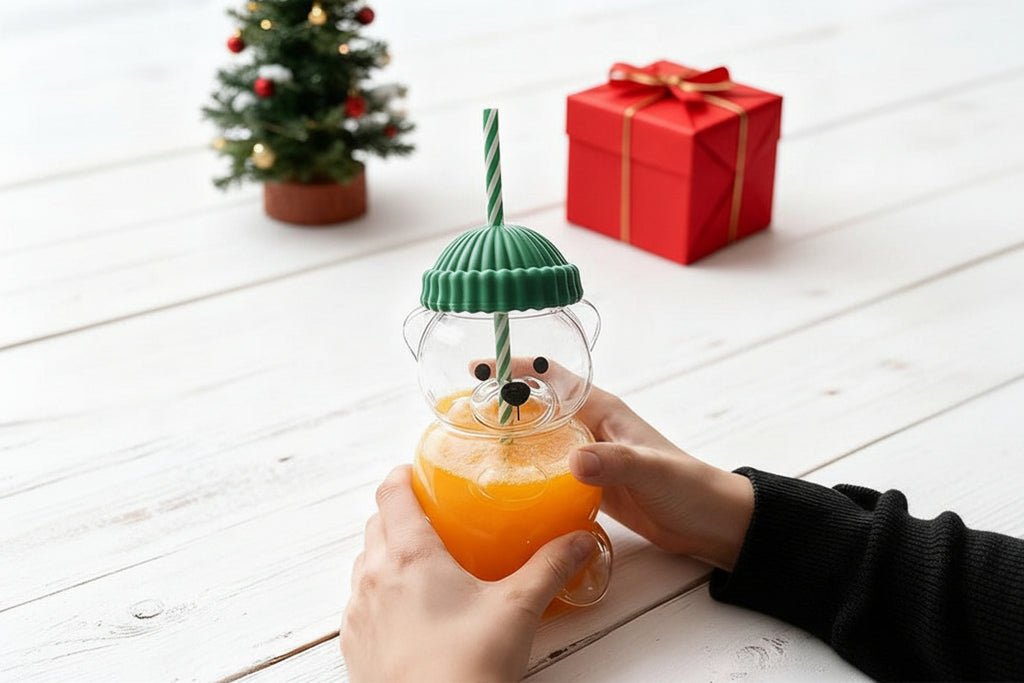 Transparent glass bear cup showing drink inside - cute holiday design